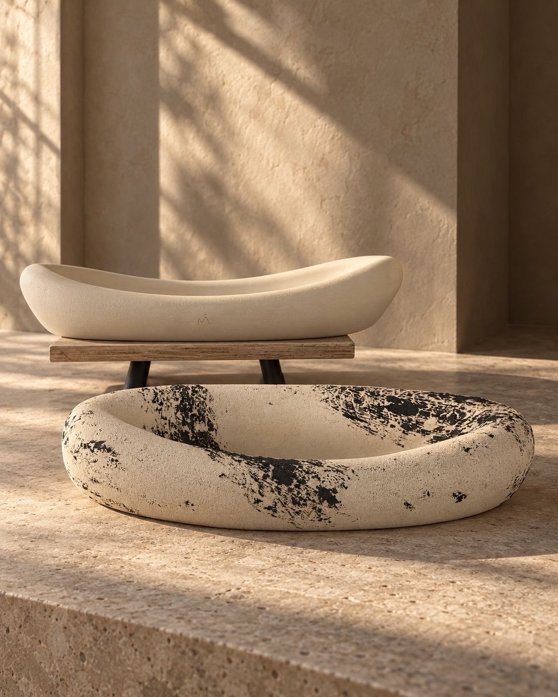 A flowing ivory ceramic vessel on a wooden stand above a larger ivory-and-black vessel